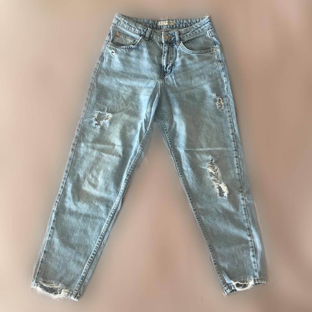 Distressed light wash mom jeans